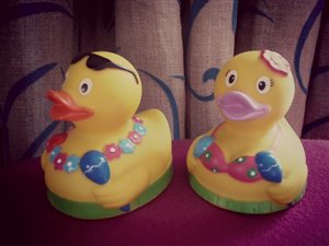 Rub a dub dub yellow ducks in a tub
